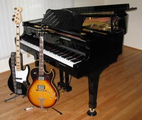 photo of piano, guitar and bass